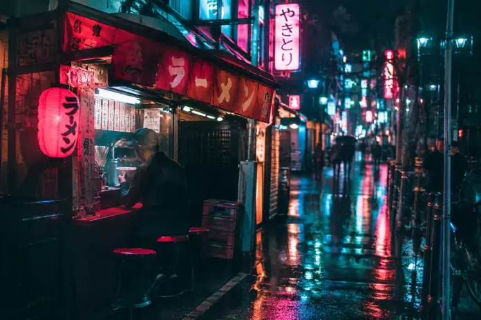 Image made with GPT Image 2.5 Flare: Steam rising from a bowl of ramen at a tiny neon-lit street stall in the Tokyo rain at nig